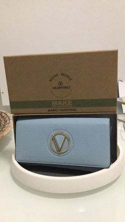 This item is a VALENTINO by Mario Valentino Katong Wallet in a light blue color