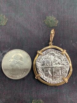 Atocha silver coin pendant in gold bezel