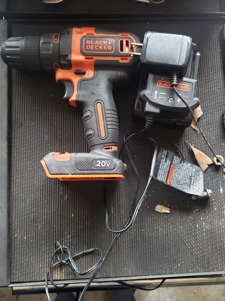 Black and Decker drill plus battery and charger
