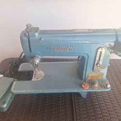 Antique This is a vintage Triumph Precision  sewing machine.