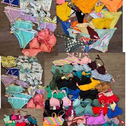 Mercancía de verano tops ,bikinis , llantas todo etiqueta nuevo 185 piezas + 23 salvavidas