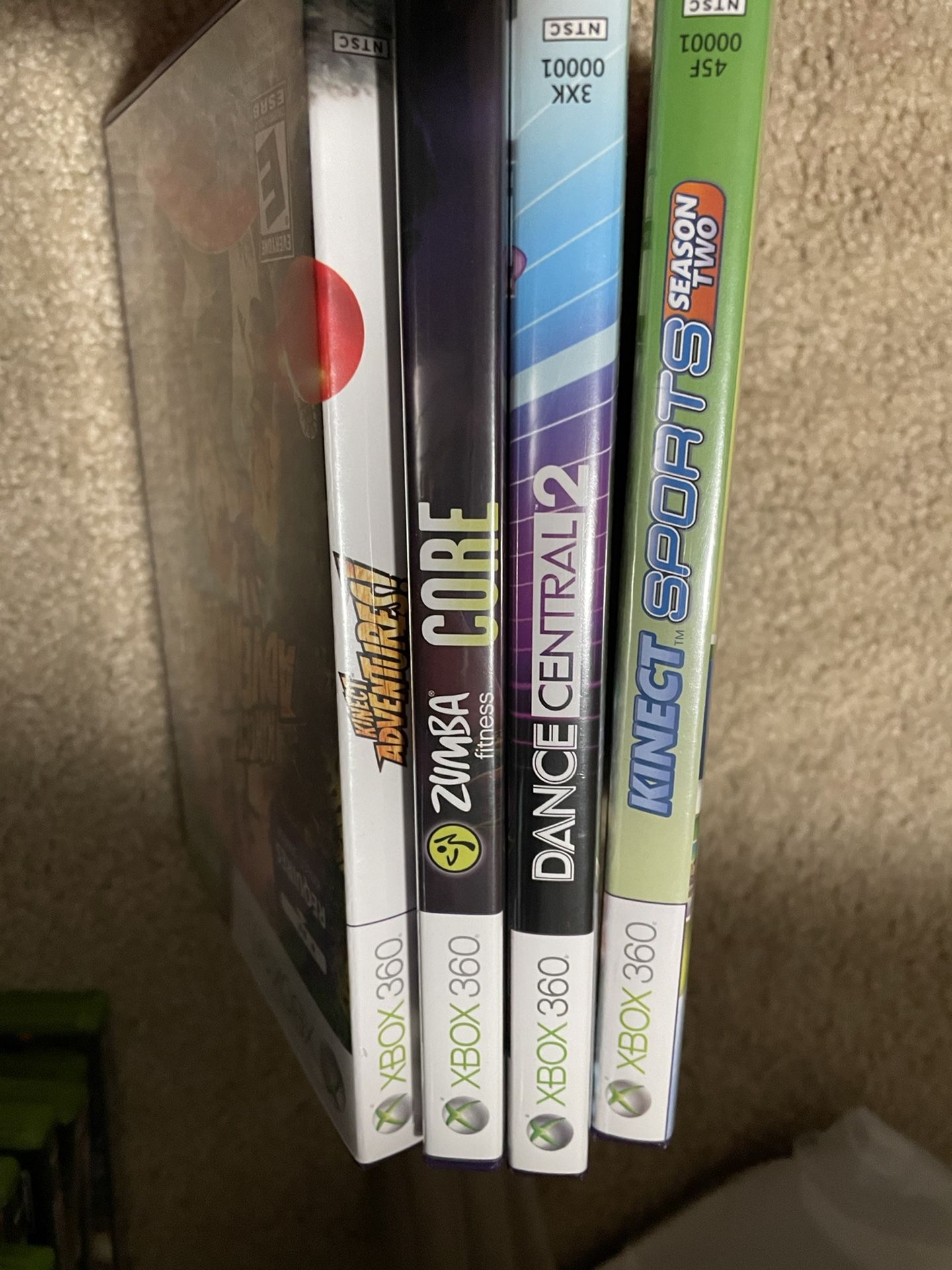 Set of 4 Xbox 360 Kinect games. 4$ for all 4. Zumba fitness core Dance central 2 Sports season 2 Kinect adventures