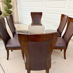 Glass Top Table And 6 Chairs