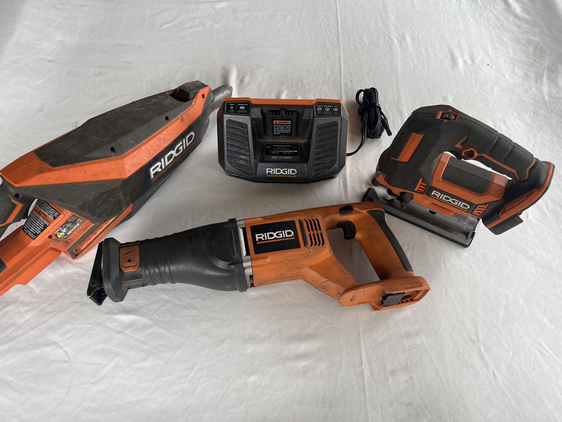 Ridgid Package Deal For 4 Items Sawzall Jigsaw Charger Vacuum