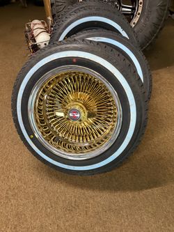 14x7 100 spoke center golds luxor wire wheels on 1757014 venom power white walls