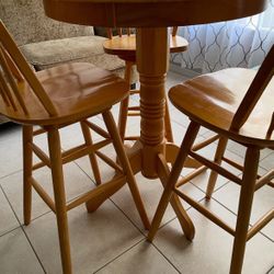 Table Round Wood Bar with Swivel chairs