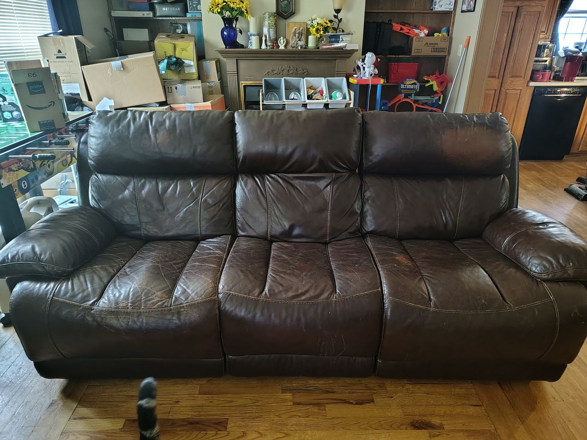 Brown Leather reclining couch and loveseat