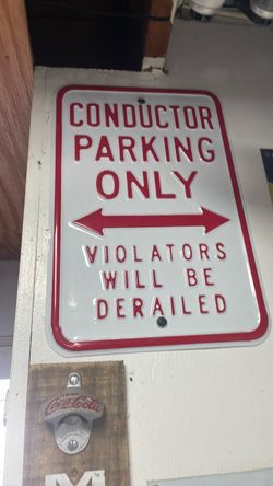 vintaje Conductor Parking only violators will be Derailed Metal sign