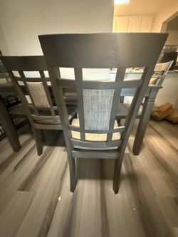 Beautiful grey 6 seater wooden dinning table
