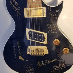 Gibson Night Hawk Guitar Signed By Doobie Brothers
