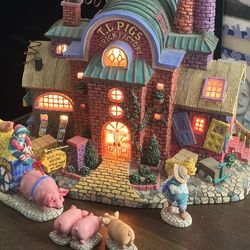 Department 56 "T.L. Pigs Brick Factory" from the Storybook Village collection, originally released in 1996 and retired in 2004.