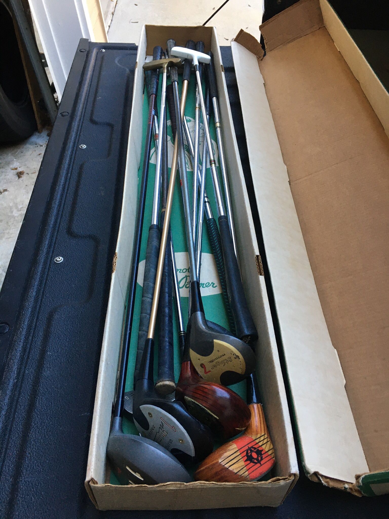 13 total random clubs and putters Multiple brands in Arnold Palmer box