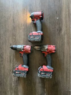 2 Milwaukee drills, 1 Milwaukee impact and 3 5.0 batteries