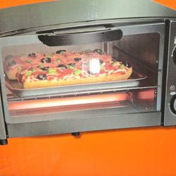 Proctor Silex 4 Slice Toaster Oven Broiler, 1050 Watts, Black.