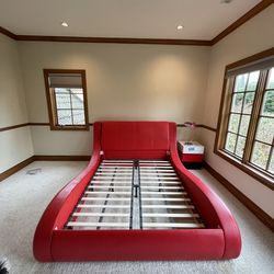 Queen size red leath bed