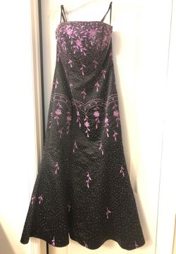 Party dress size 12 or medium ,still Available .