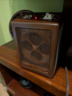 Furnace Space Heater office bedroom next to chair