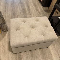 Gray storage ottoman 