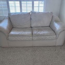 Free beige leather loveseat
