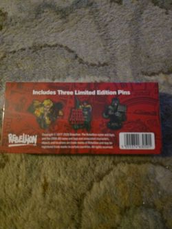 SDCC 2026 2000 AD Judge Dredd pin set