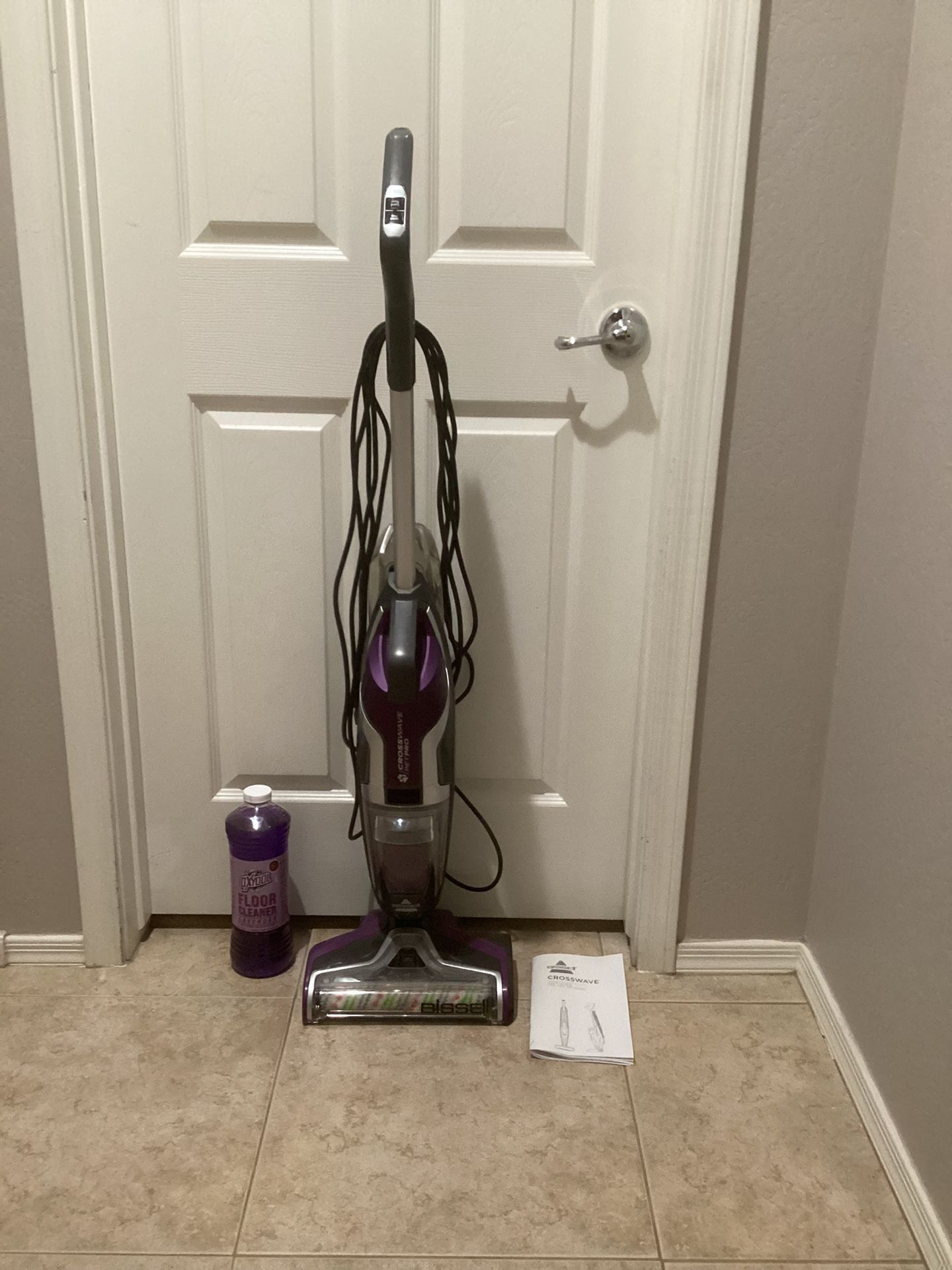 Bissell crosswave hard floor cleaner with an unopened bottle of specialized  floor cleaner      (excellent condition)