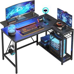Bestier Gaming Desk with Power Outlets, 42" L-Shaped Gaming Desk with LED Lights, Desk with Reversi