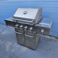 KitchenAid 4-Burner Gas Grill with a side burner and stainless steel construction., well maintained, No Tank