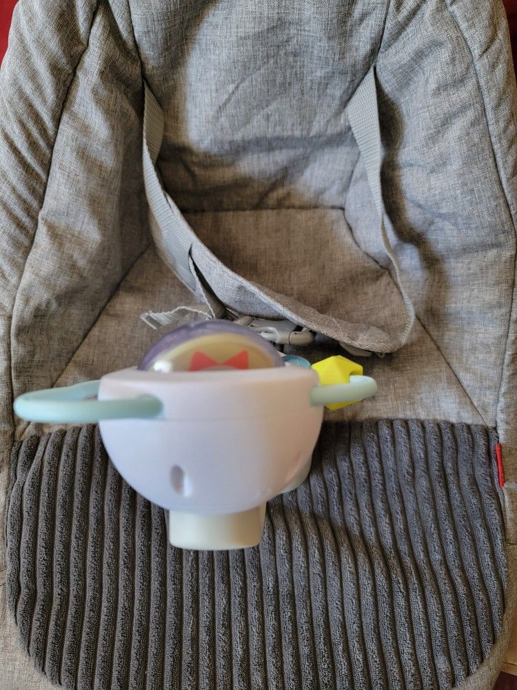 GREY BABY SEAT W/ TOY $10