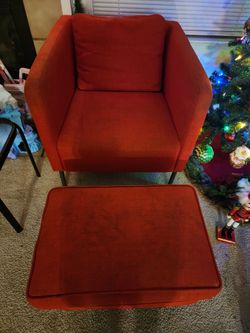 Orange two chair and one ottoman