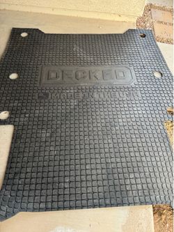 Decked truck bed mat