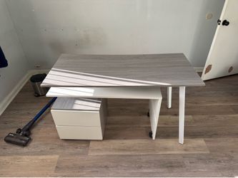 L desk with rotatable tops and drawers