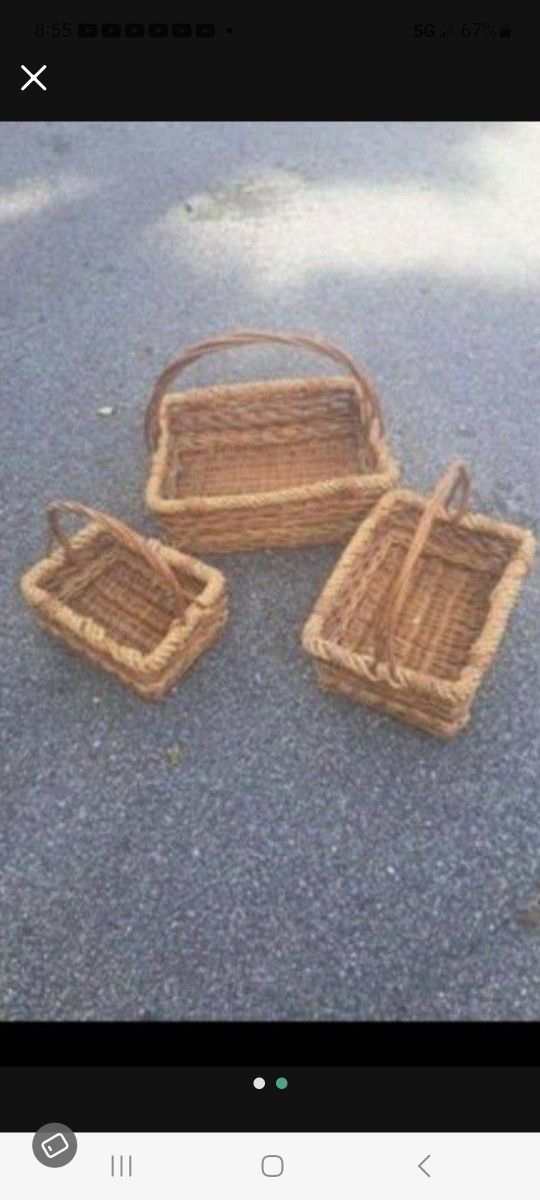 THREE THICK HEAVY DUTY WICKER BASKETS