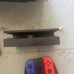 Nintendo Switch Dock w/ Red & Blue Joy-Cons, Grip & Wrist Straps – No Console