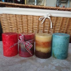 4 PILLAR CANDLES $10.00