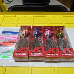 Four 200g Shimano Lucanus Jigs With Skirts