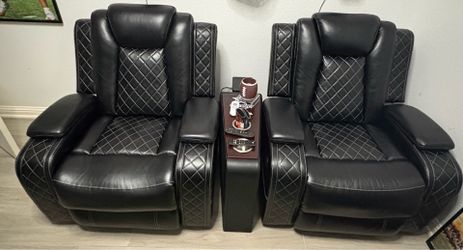 Set of black recliners for only 400.00