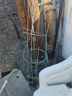 Plant guide wire, cement molds, big red bucket, metal screen