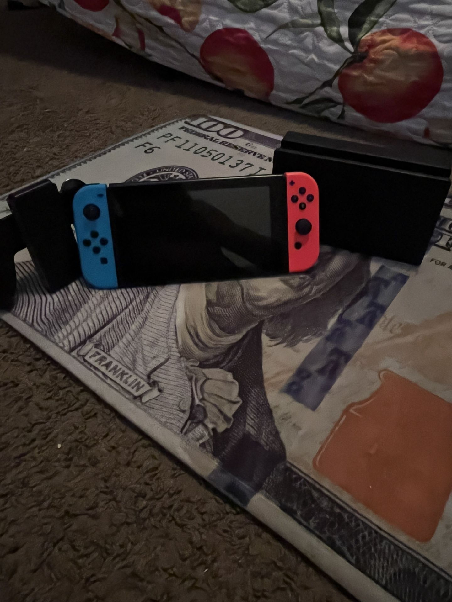 Nintendo Switch with Neon Blue and Neon Red Joy-Con