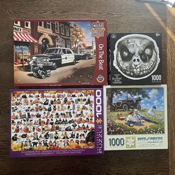 Four 1000 Piece Jigsaw Puzzles
