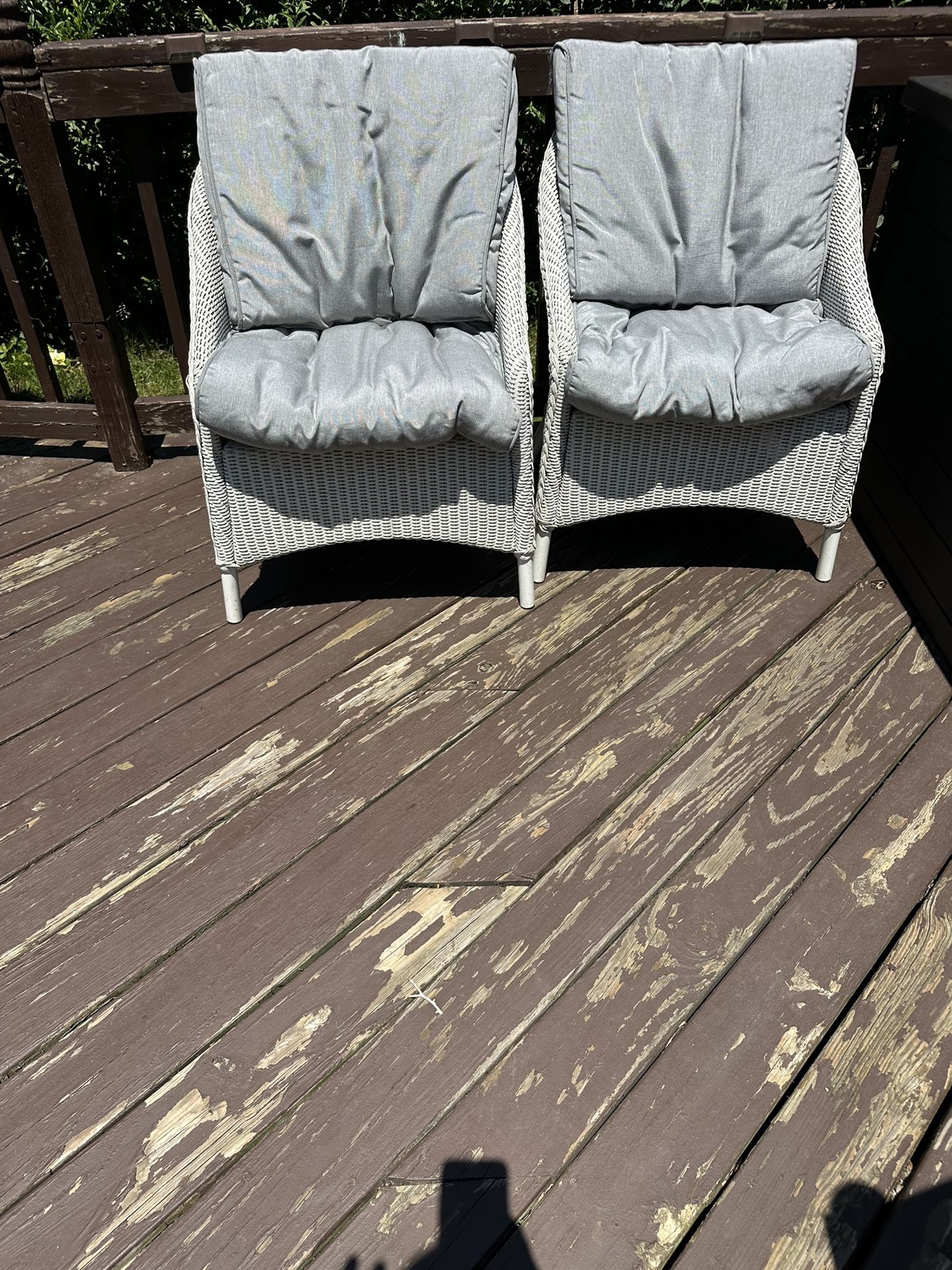 Two White Wicker Chairs With Cushions