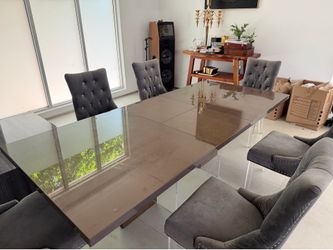Made in Italy walnut extendable dining table.