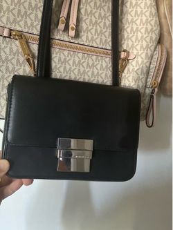 Black cross over Mk purse