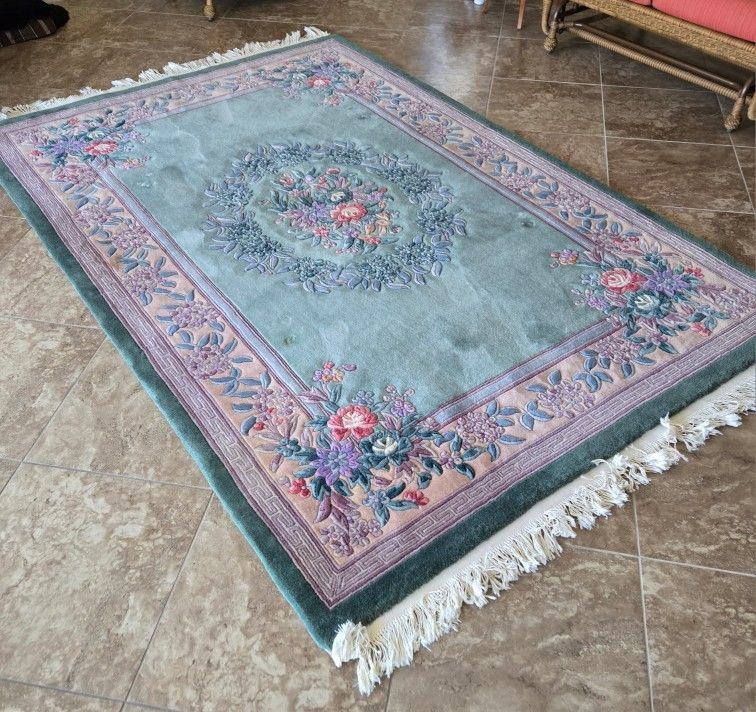 Oriental Rug And Square Glass Table