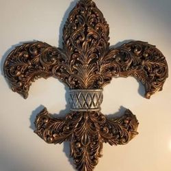 TWO SEPERATE LARGE BEAUTIFUL FLEUR DE LIS GOLD STONE WALL PLAQUES - $45 (Harahan)