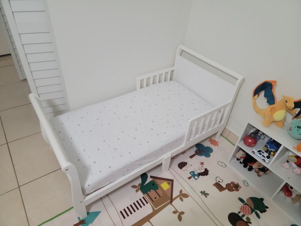 Delta Children Wood Toddler Bed Sleigh, Regular Crib Size, White