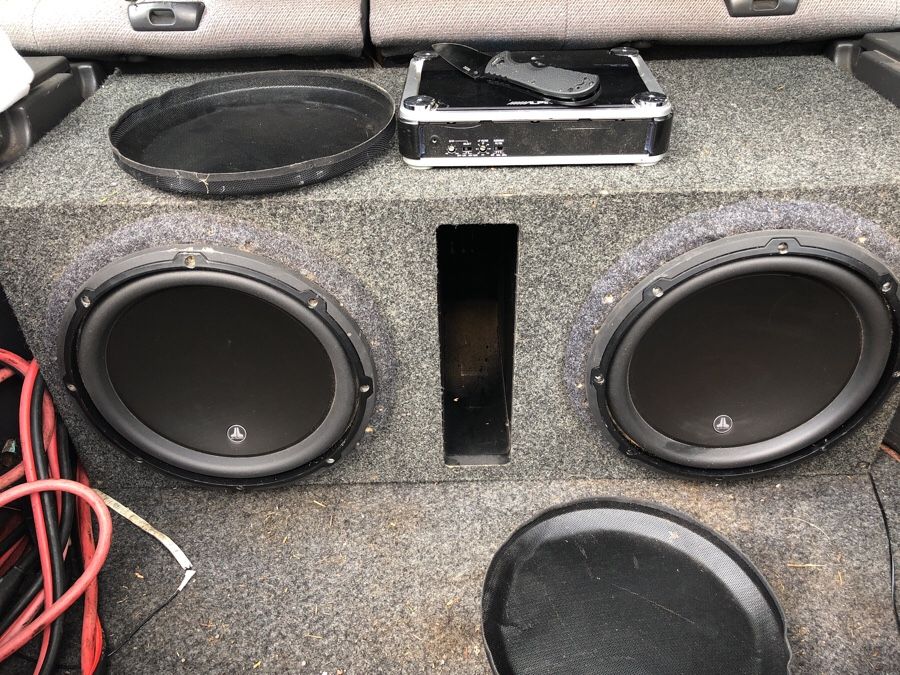 2 12” JL 12w3v3-4 in huge really thick custom ported box ..and Alpine pdx-1000 amp ..has 1000watts at 1 or 2 ohms