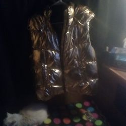 A Gold Jacket With No Sleeves