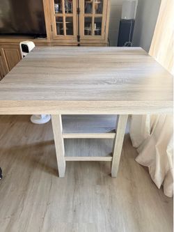 Grey bar height table