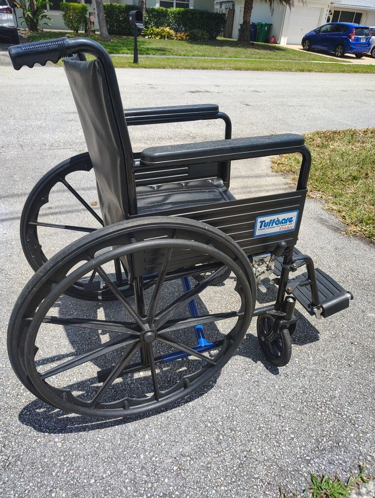 Wheelchair With Leg Attachments