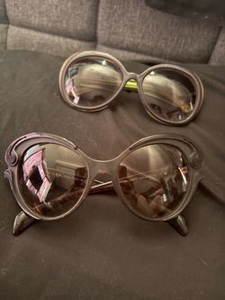 Prada and Alexander Mcqueen sunglasses